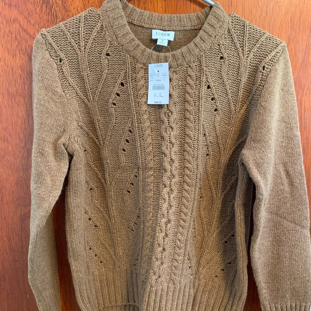 Never before worn wool sweater.